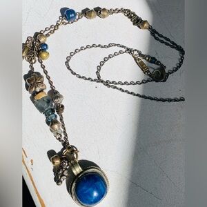 Stunning 70’s Necklace. Heavy with bells, beads, lrg blue stone w/ engraved bird